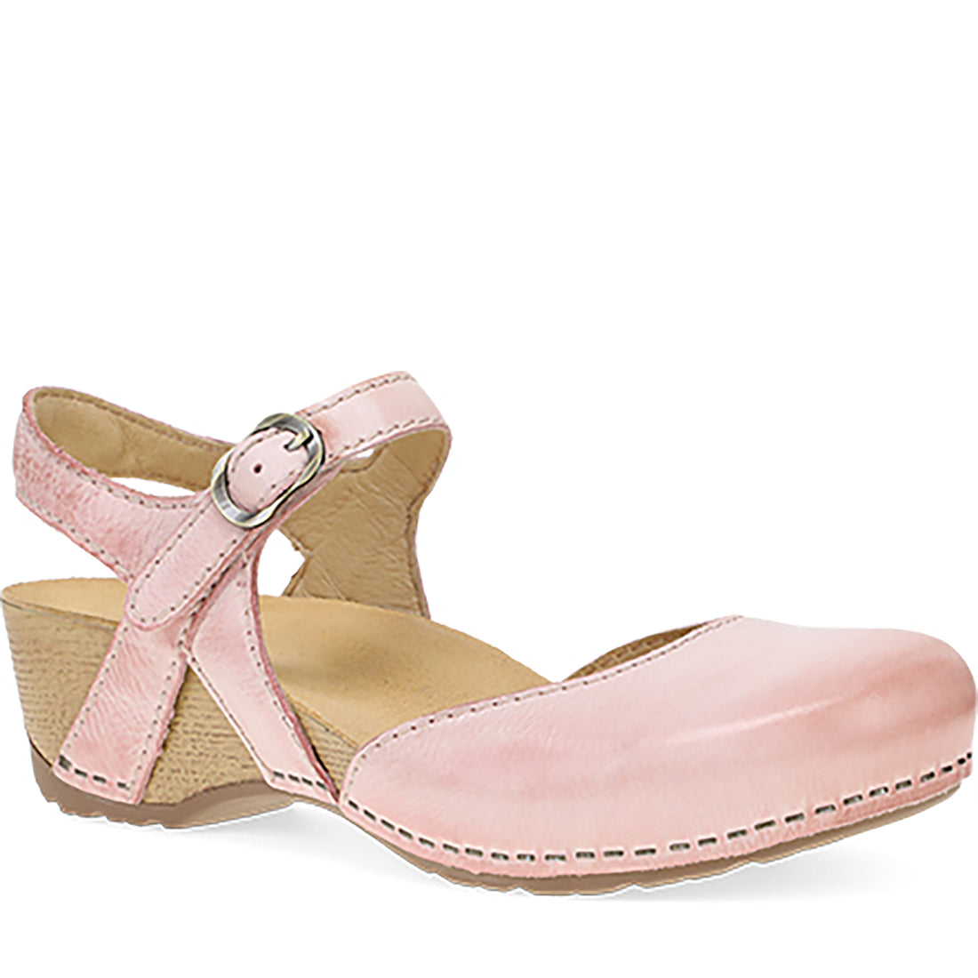 Pink wedge sandal with a strap on a white background