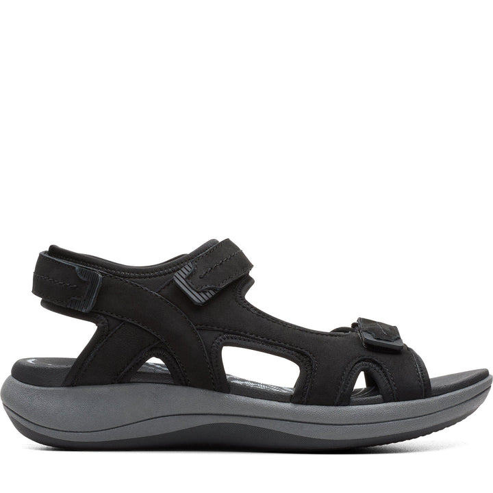 Quarter turn Women's Clarks Footwear style name Mira Free Wide in color Black Nubuck. Sku: 26182075W