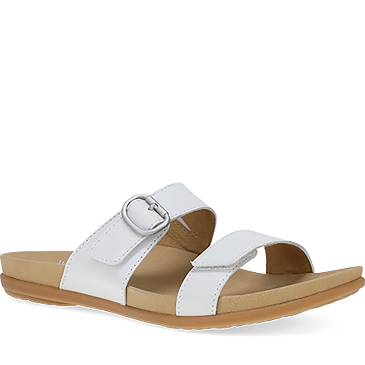 Quarter turn Women's Dansko Footwear style name Justine in color White Full Grain. Sku: 6220001200